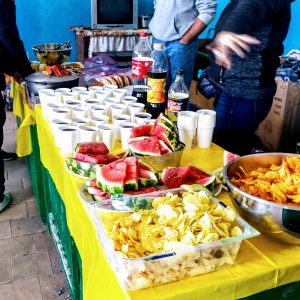 Sharing a meal in Poplavka