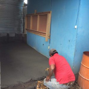 Cement floors in Ruth's new workshop - the only non-dirt floors in her home.