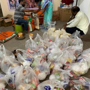 Packaging food to take to the widows in the lepers' slum