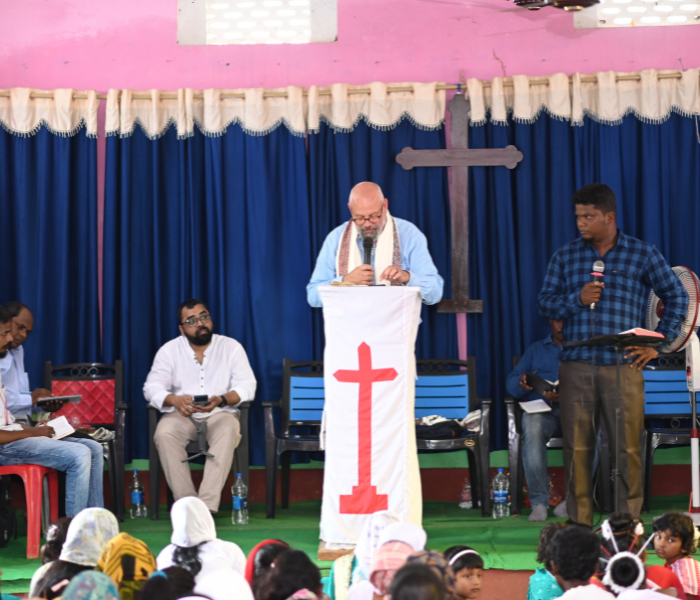 Lionel preaching India