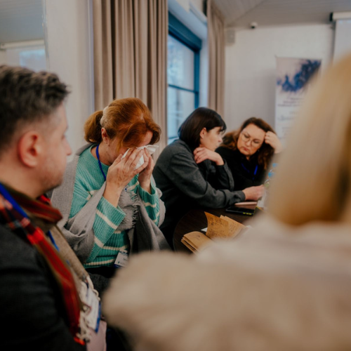 A participant is touched and brought to tears during a session