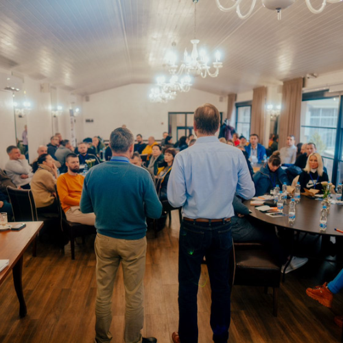 Dr Philip Monroe (right) teaches a group of 60 Ukrainian leaders