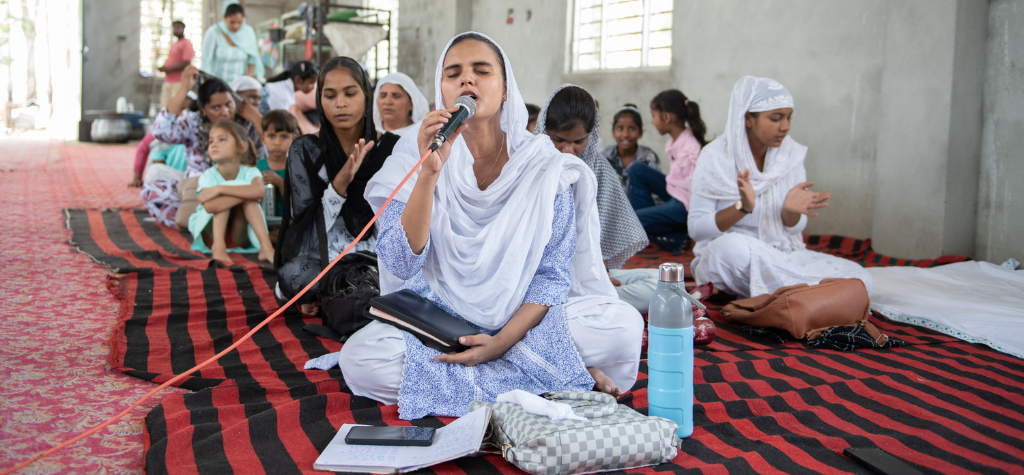 group of women in india praying